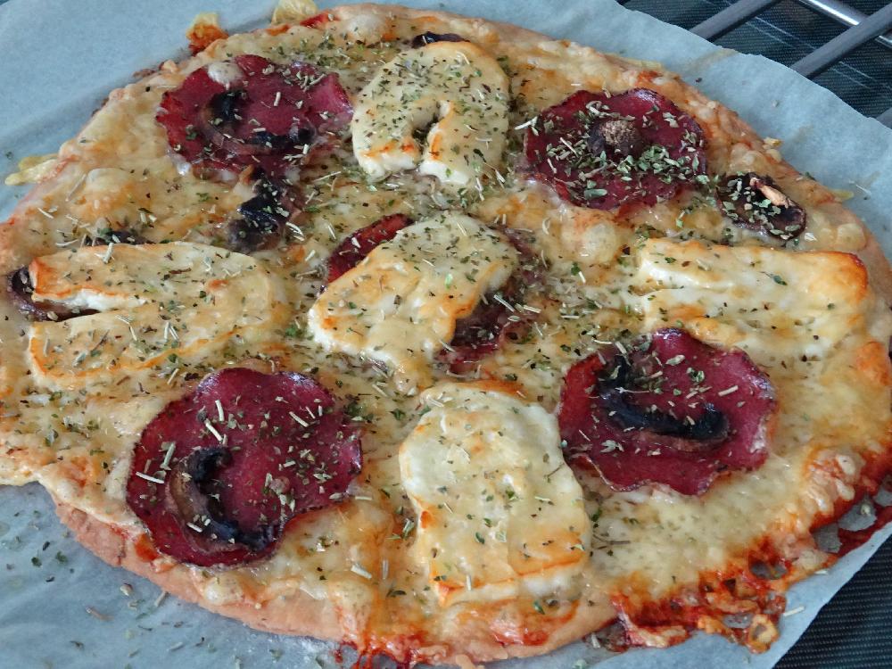 Tortilla pizza with halloumi cheese and salami
