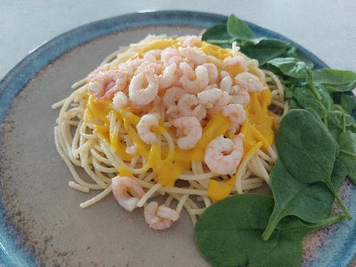 Creamy saffron sauce with  shrimps and spaghetti picture