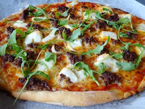 Pizza with mincemeat and goat cheese picture