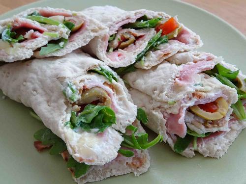 Swedish soft flatbread wraps with ham and olives picture