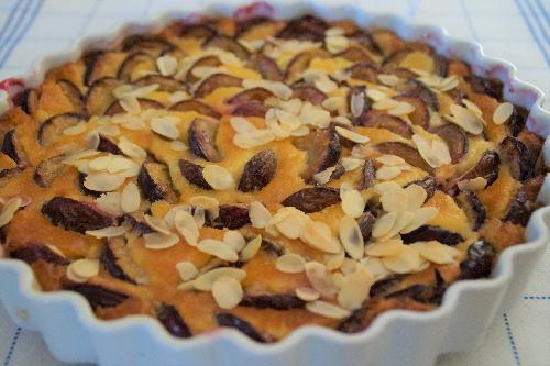 Plum tart with almond flakes picture