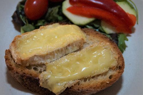 Oven baked Camembert cheese on bread picture